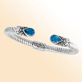 "Handmade sterling silver Blue Topaz Bali cuff bracelet with rope twist design and Quartz accents"